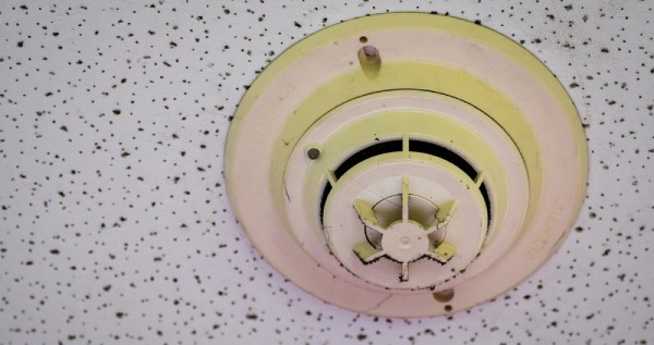 Old and dusty smoke alarm