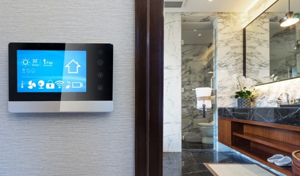Smart control screen in a modern bathroom