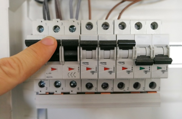 Switching a circuit breaker inside an electrical panel