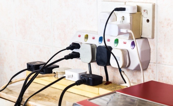 Multiple electricity plugs on an adapter